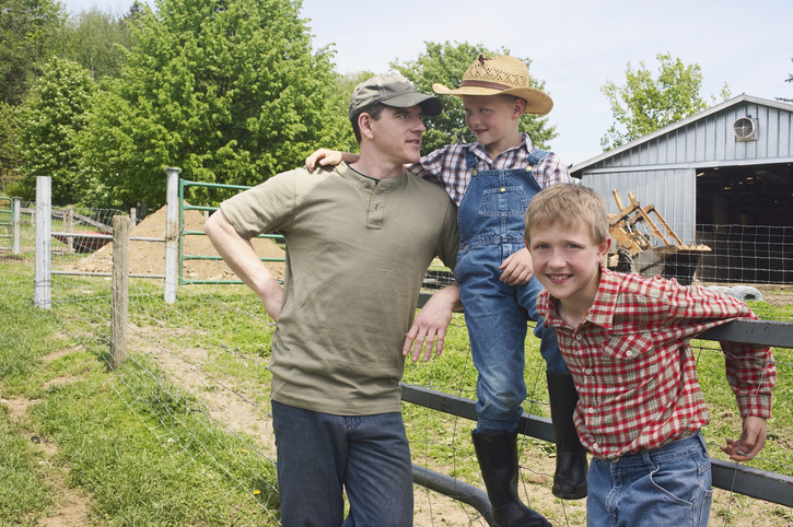 Father and sons on humane standards farm